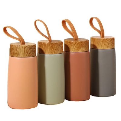 Δείγμα 280ML Κύπελλο από ανοξείδωτο χάλυβα ξύλου με κόκκινο σπόρο για Custom Logo Παιδιά Πυροβόλο